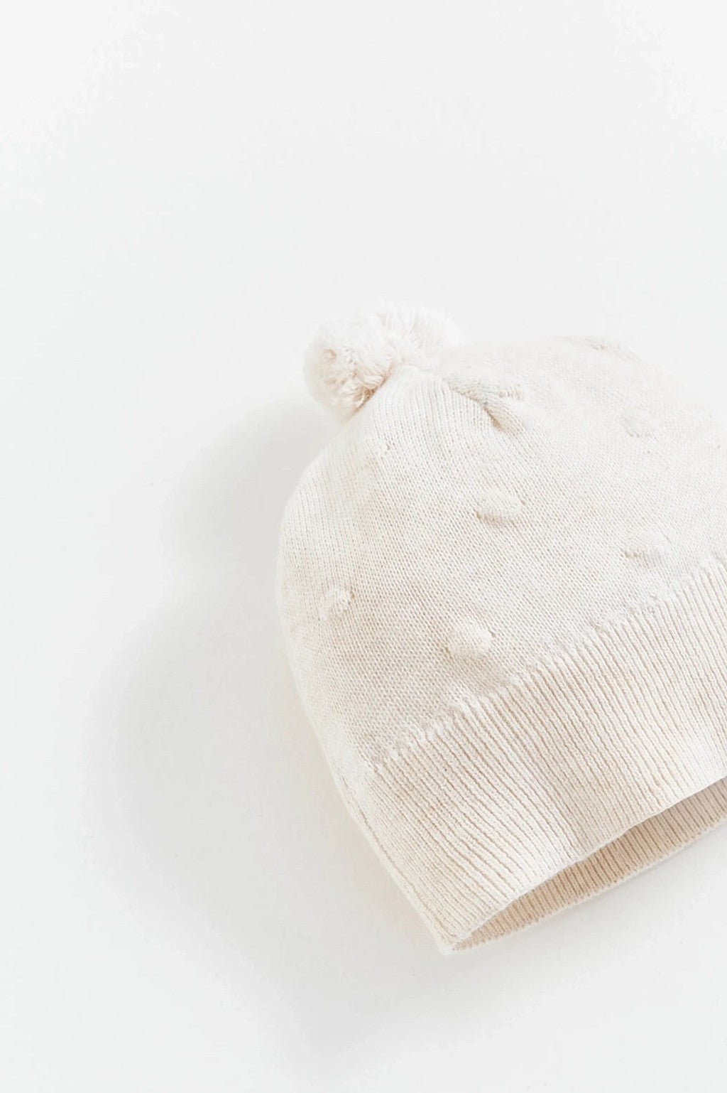 Gorro tejido my first knit Crudo