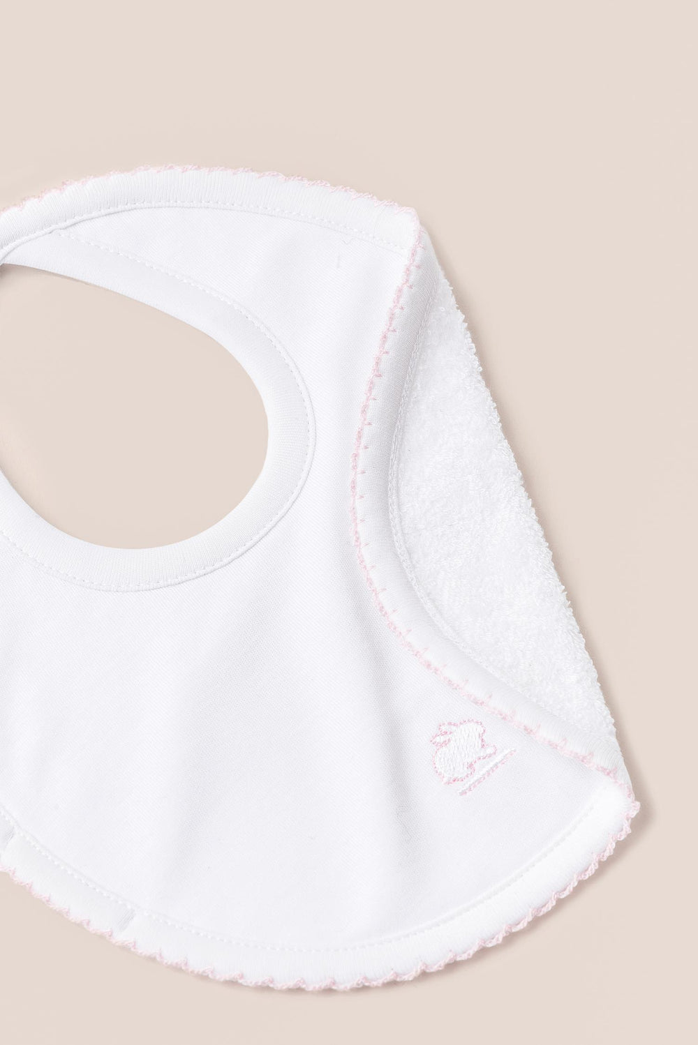 Babero NB logo rosa
